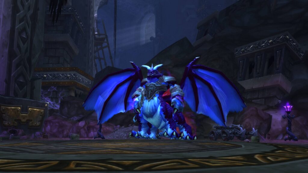 A fearsome blue dragon stands in a dark, ancient dungeon setting within World of Warcraft Classic, showcasing the challenging PvE content that players can conquer with the right gear and resources. Buy WOW Gold on Gamer-choice.com