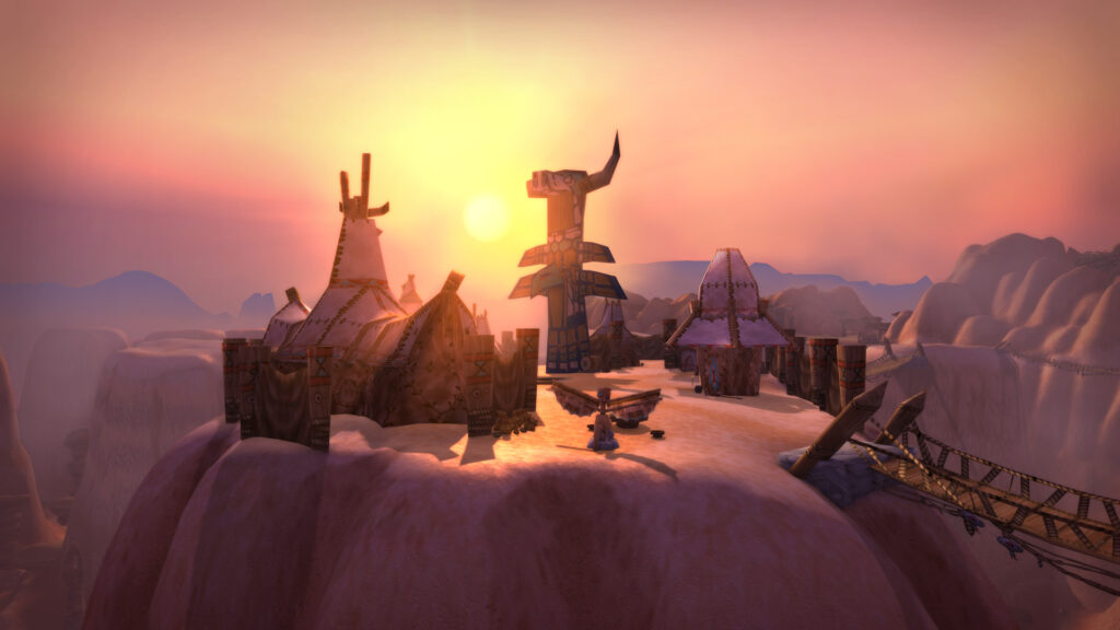 A sunset over the tauren settlements in Thousand Needles, showcasing the unique landscape and architecture in WoW Classic.