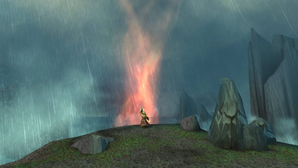 A character faces a fiery vortex in the Maelstrom, under heavy rain, in the chaotic World of Warcraft: Cataclysm zone.