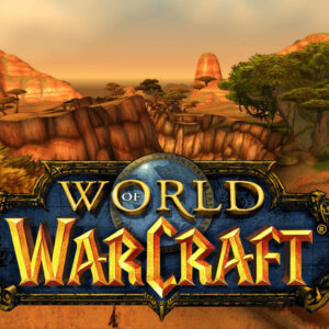 A vast, arid landscape in the Barrens, a zone in World of Warcraft Classic, with a deep, fiery chasm cutting through the earth, showcasing the harsh and unforgiving environment of the game.