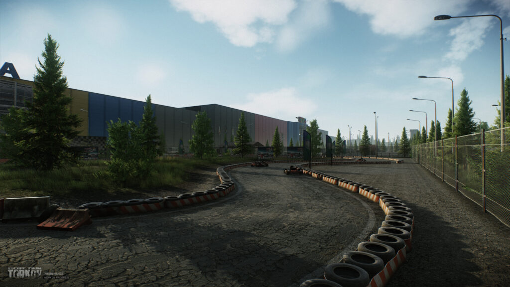 Interchange map race track in Escape from Tarkov with trees and streetlights.

