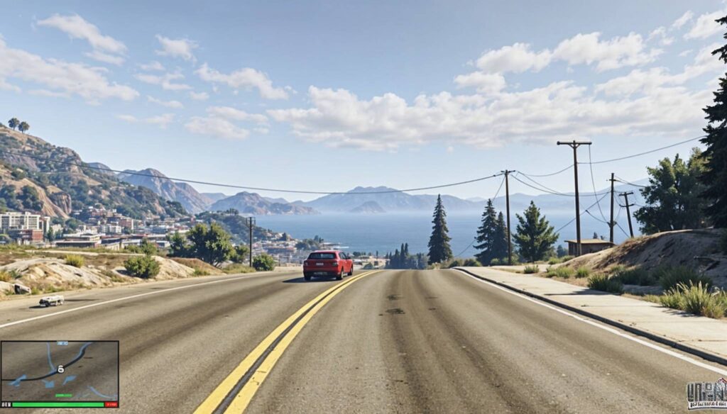 Scenic road view in GTA 5 Online with a red car driving toward the coastline.
